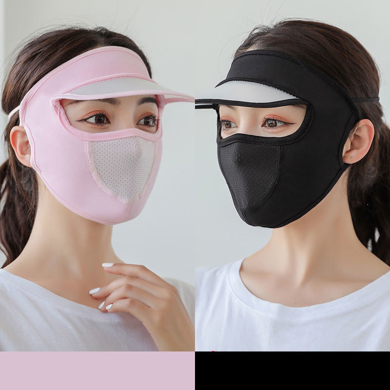 Two models wearing face masks with visors, one pink and one black, on a plain background.
