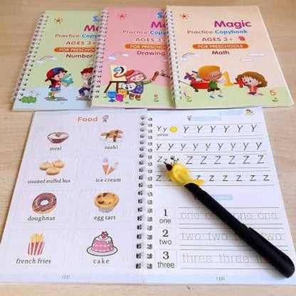 Educational books for preschoolers with a pen on a wooden surface