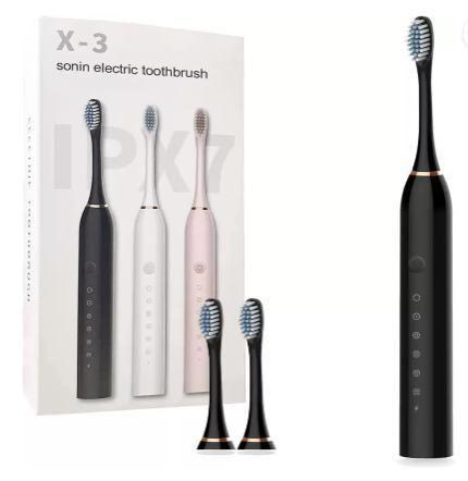 Black electric toothbrush with packaging and additional brush heads on a white background