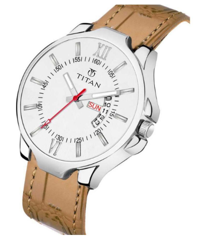 Titan watch with brown leather strap and white dial on a white background