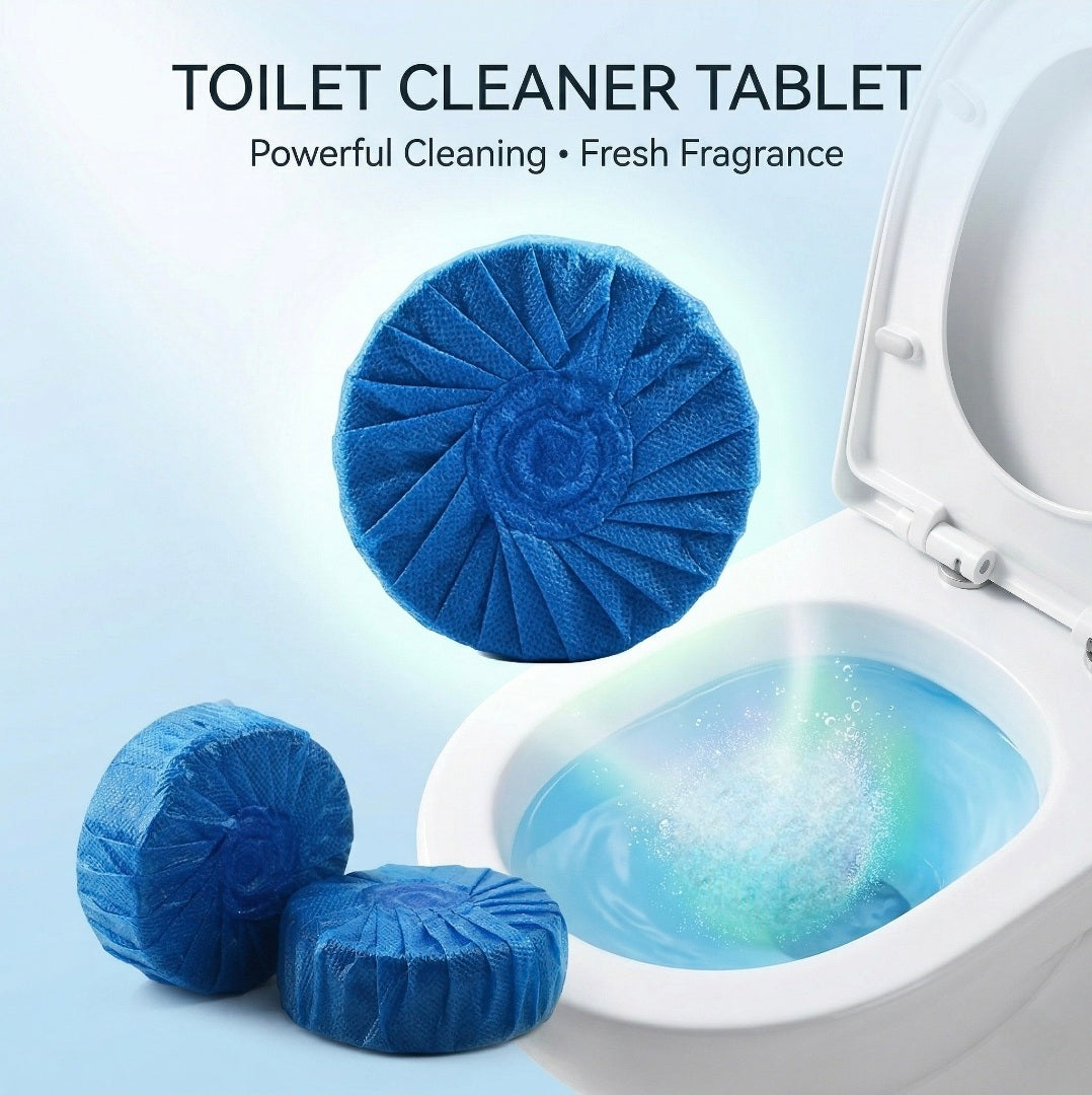 Blue toilet cleaner tablets with a toilet in the background on a light blue background