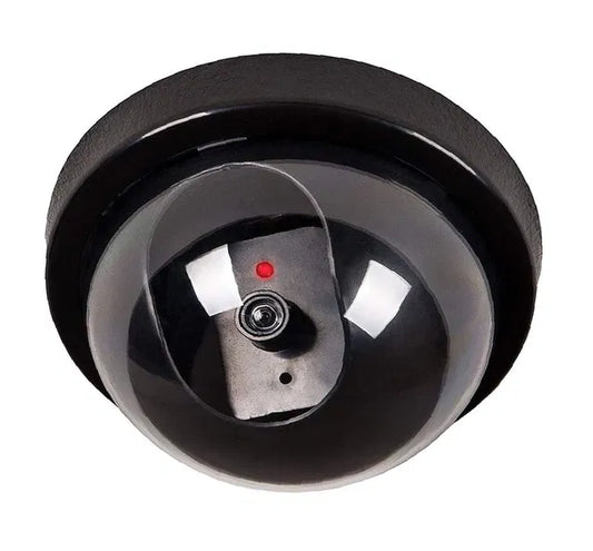 Black dome security camera on a white background
