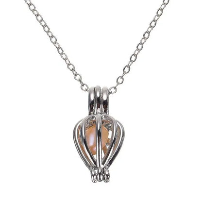 Silver heart-shaped pendant with a chain on a white background